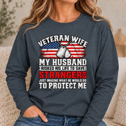 Veteran Wife Shirt – My Husband Risked His Life to Save Strangers, Gift for Veteran Wife & Military Spouse, T-Shirt, Long Sleeve, Sweatshirt & Hoodie - Long Sleeve - Dark Heather - Front